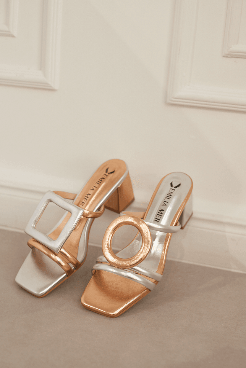 Rose gold and silver vegan retro slides with block heels and geometric buckles