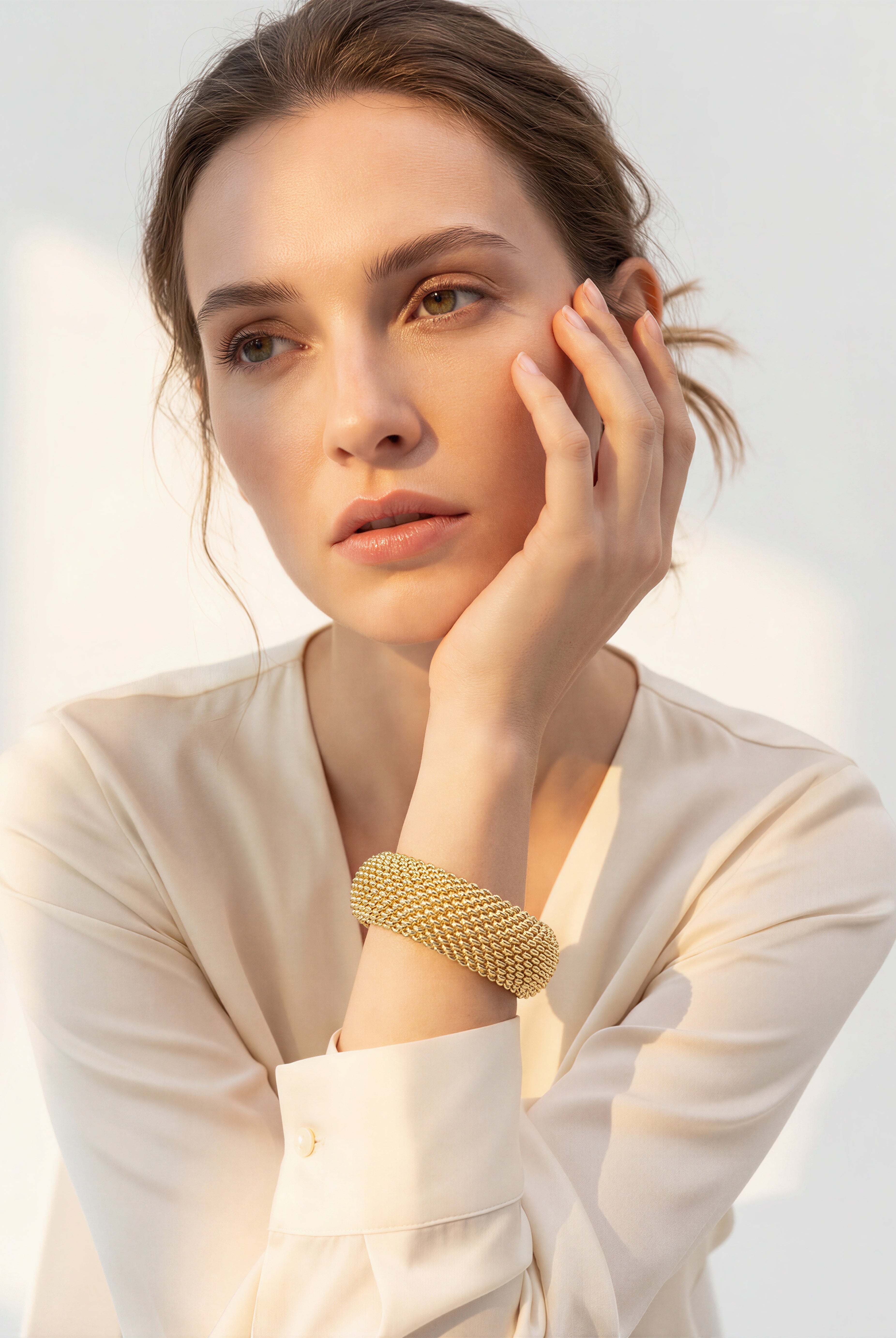 woman with golden handcuff from emilia merz