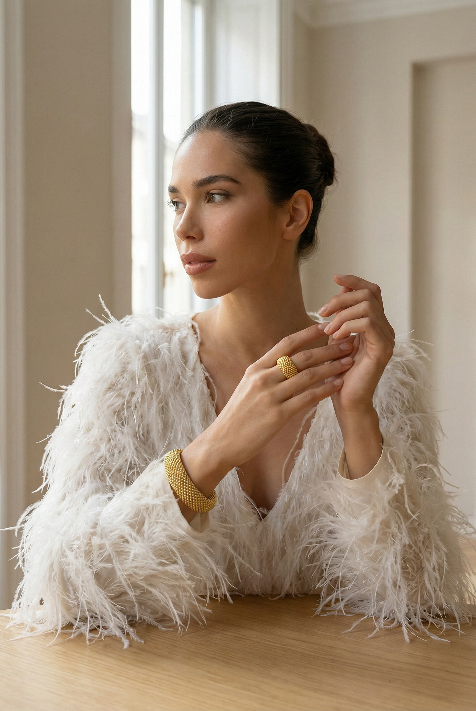 Golden Aurelia Mesh ring and cuff set on model with white fluffy top