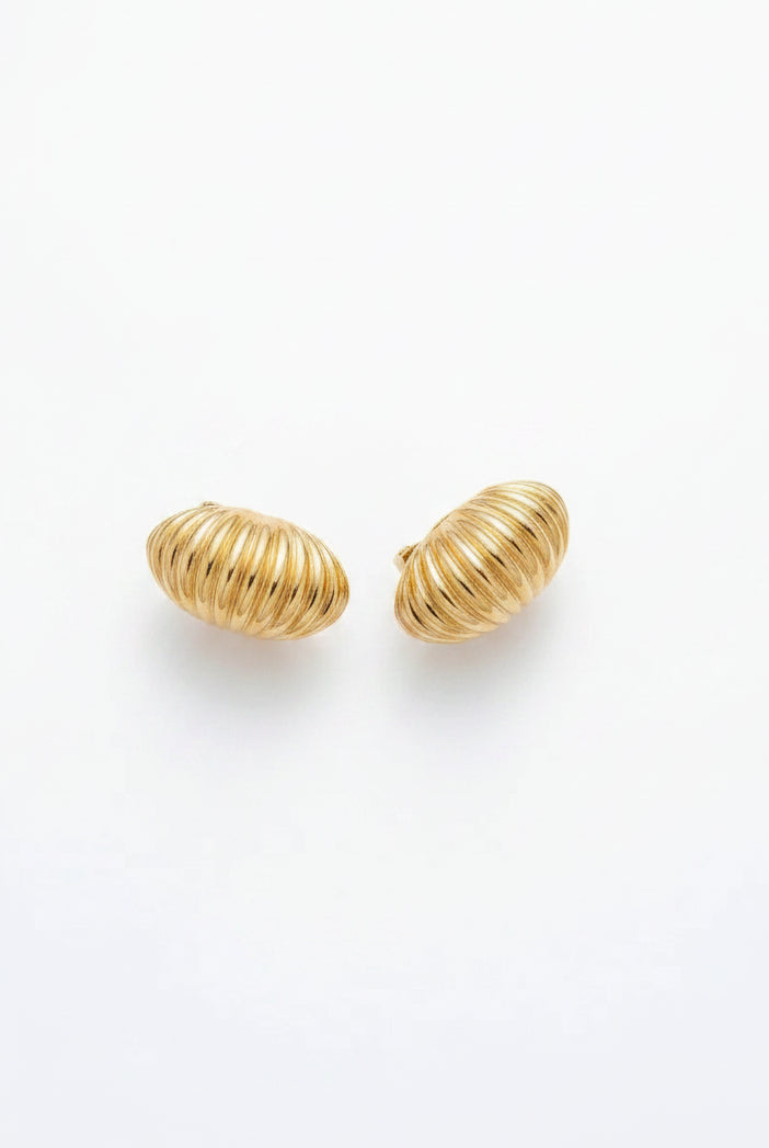 Marbella Shell Earrings featuring large, ribbed 18K gold-plated shell Emilia Merz