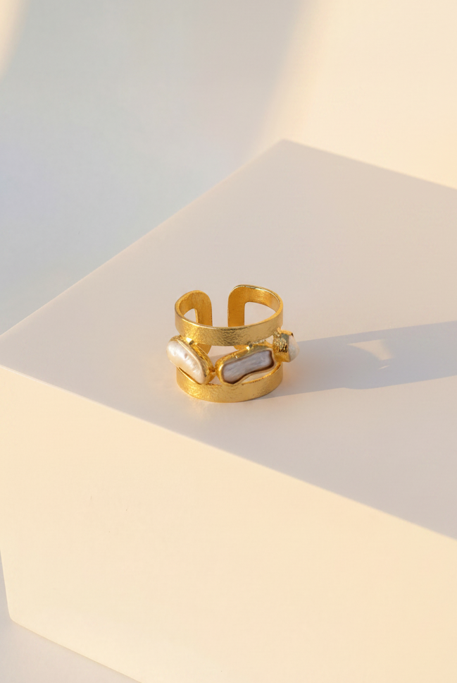 Emilia Merz Oceana Pearl Ring featuring naturally shaped freshwater pearls in an 18K gold-plated architectural frame.