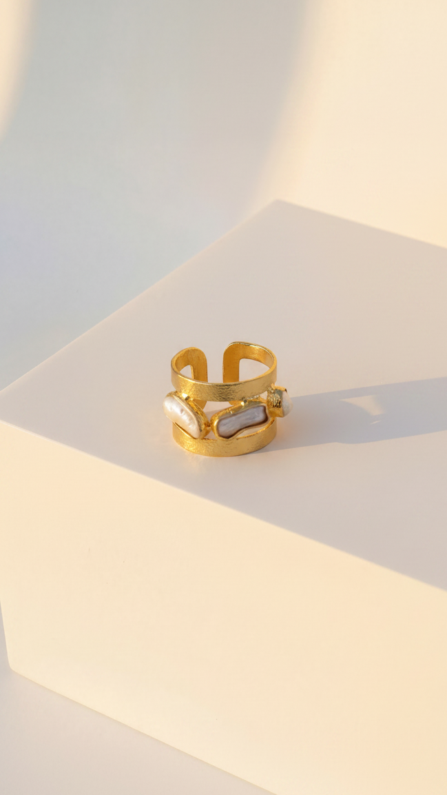 Emilia Merz Oceana Pearl Ring featuring naturally shaped freshwater pearls in an 18K gold-plated architectural frame.