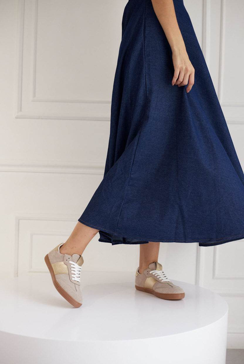 Women wearing Sky Runner beige sneakers with blue dress, German Army Trainer style