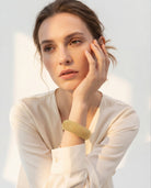 woman with golden handcuff from emilia merz