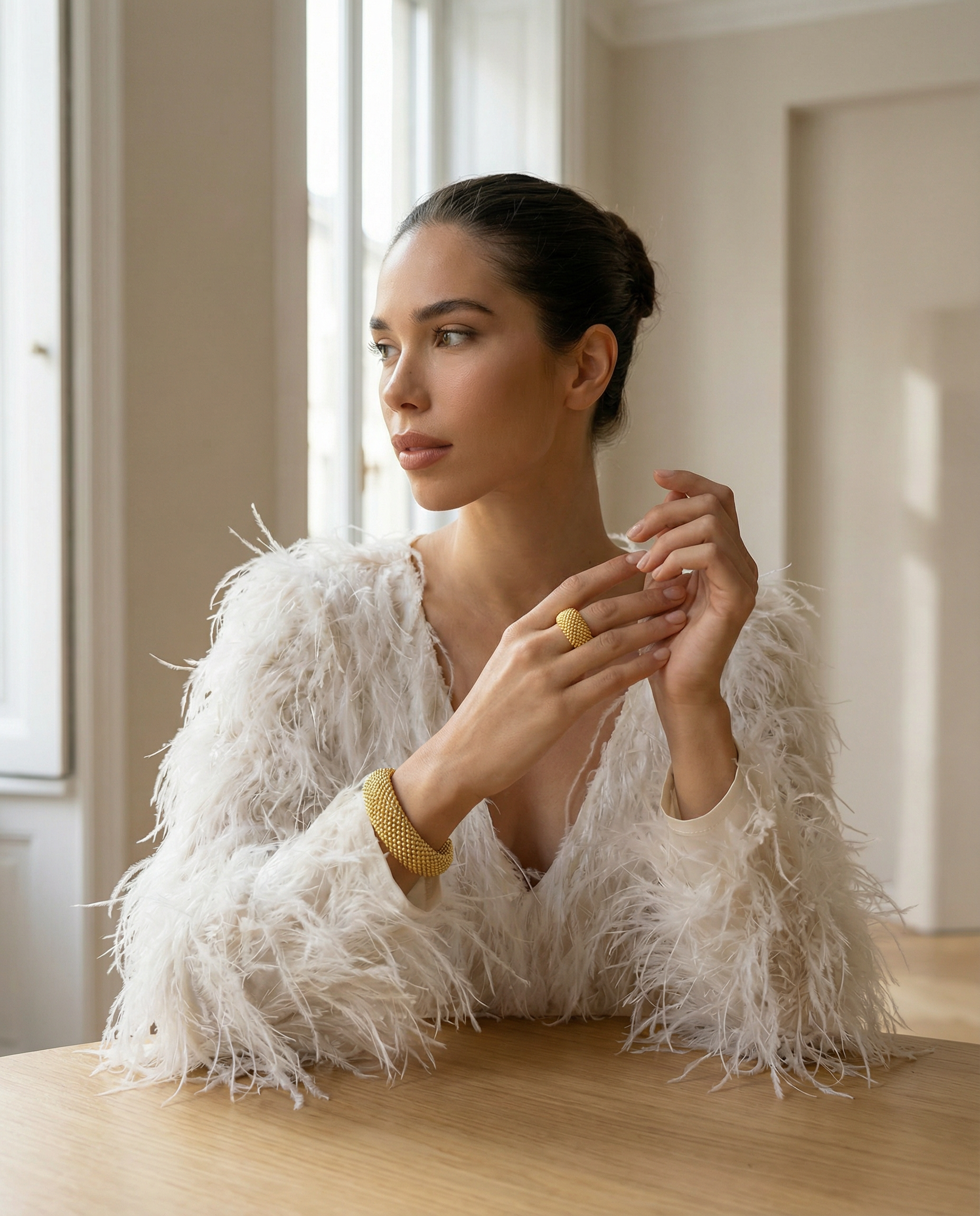 Golden Aurelia Mesh ring and cuff set on model with white fluffy top