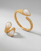 Close-up of the Serpenté Lumina set, highlighting the intricate woven gold texture and faceted stones.