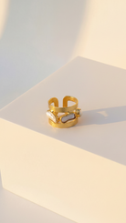 Emilia Merz Oceana Pearl Ring featuring naturally shaped freshwater pearls in an 18K gold-plated architectural frame.