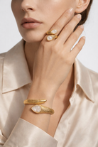 Serpenté Lumina collection golden ring and bracelet